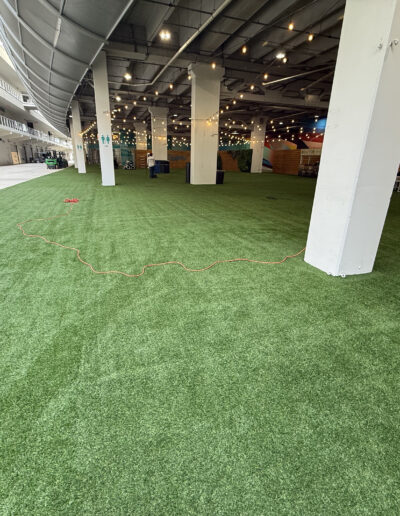 Velasquez Carpet commercial indoor artificial grass turf floor setup for large arenas