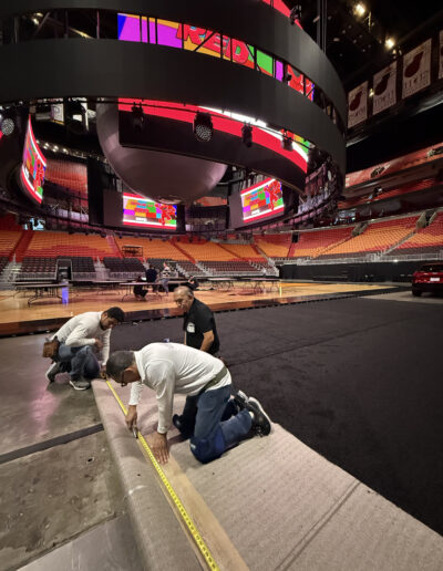 Velasquez Carpet commercial stadium flooring and protective carpet setup